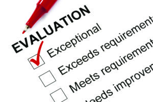 Evaluation form marked "exceptional" with red pen.
