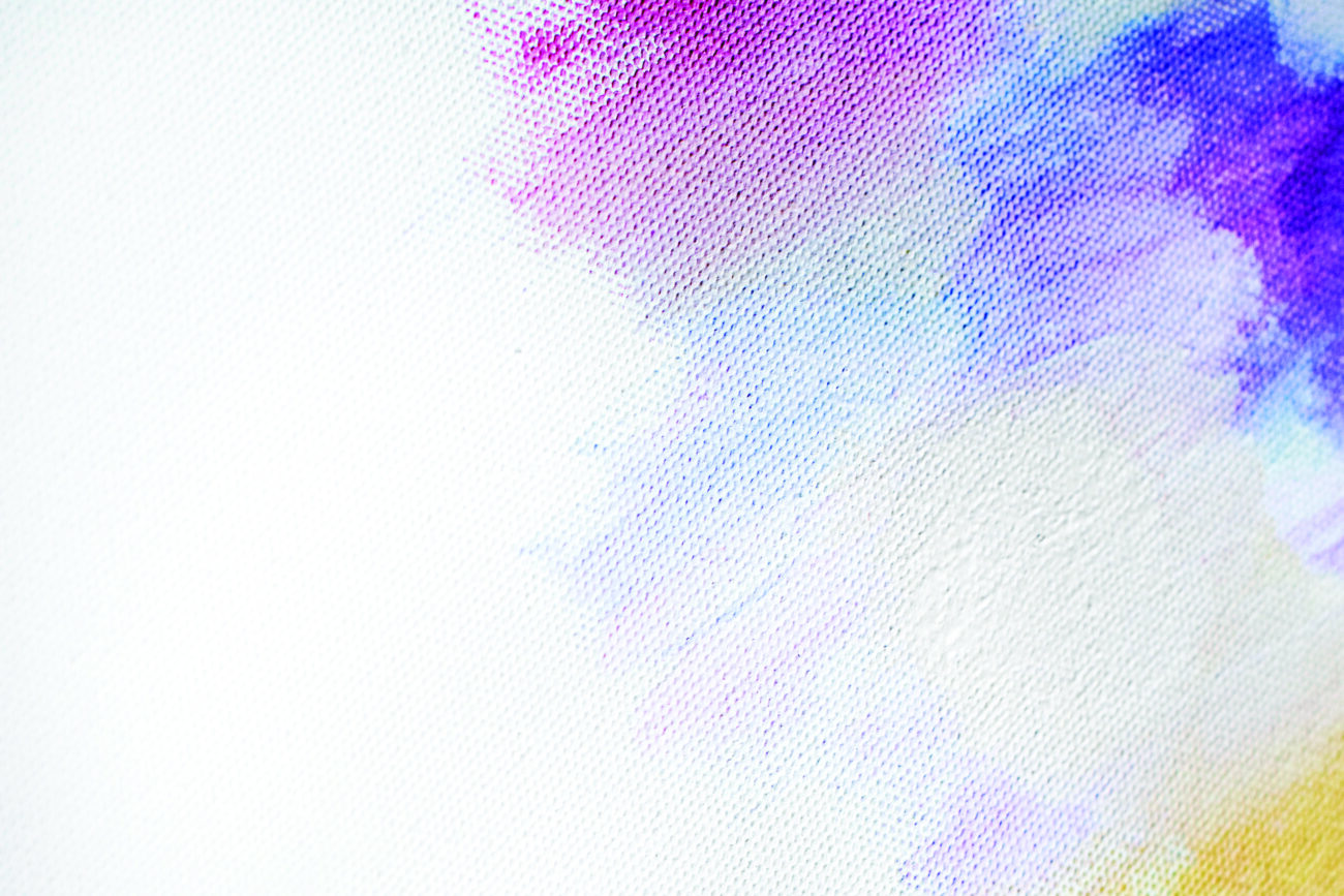 Colorful brush stroke on a canvas background